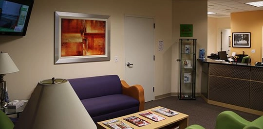 Patient waiting room with view of reception area