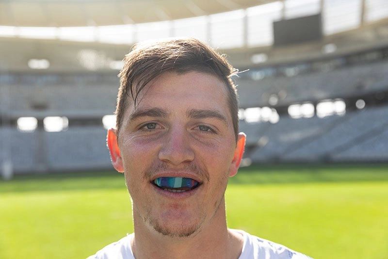 Rugby player wearing mouthguard.